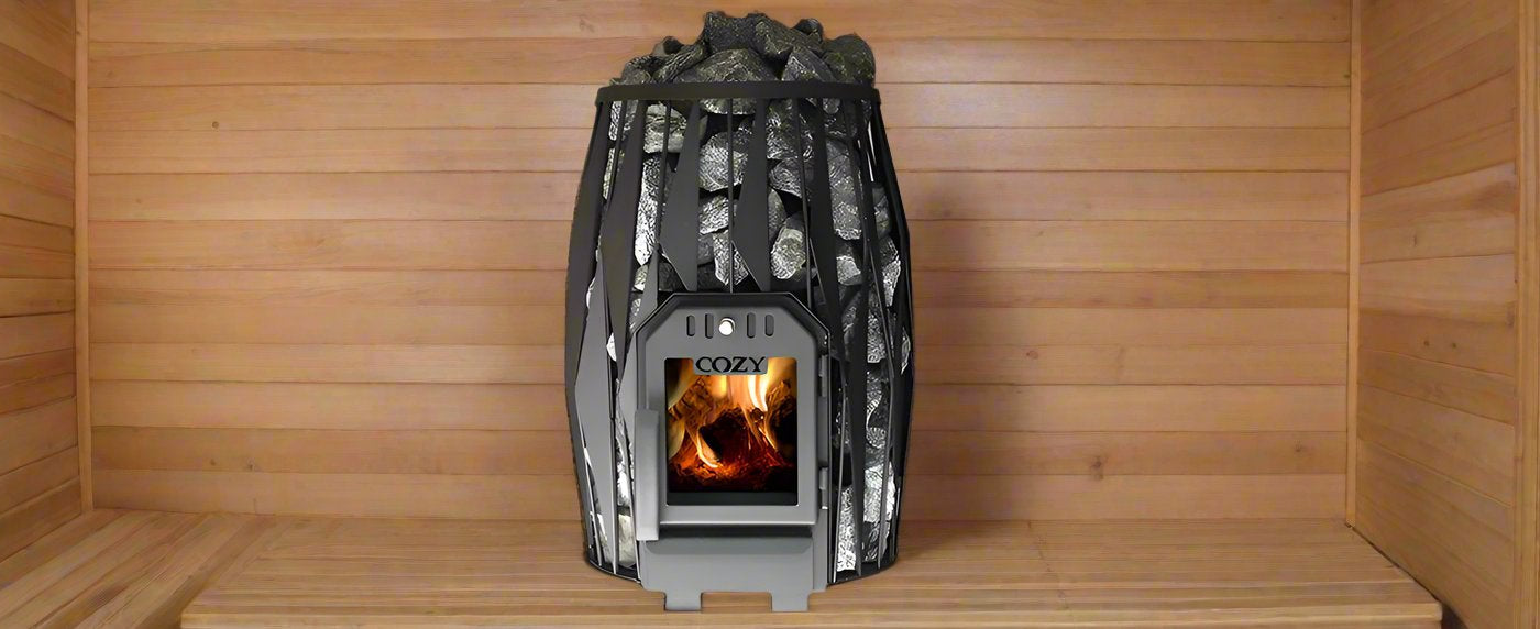 A Cozy wood-burning sauna heater filled with stones and a burning fire inside a wooden sauna room.