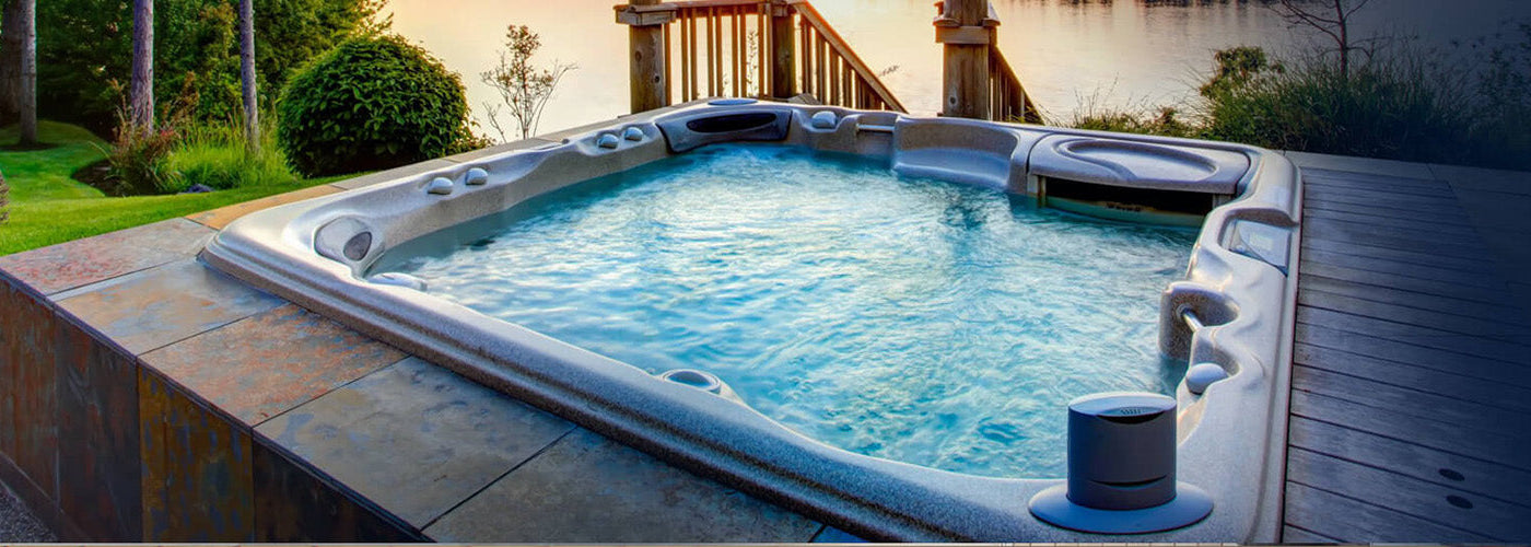Luxury spa features including hydrotherapy jets, digital controls, LED lighting, and a cold plunge option.