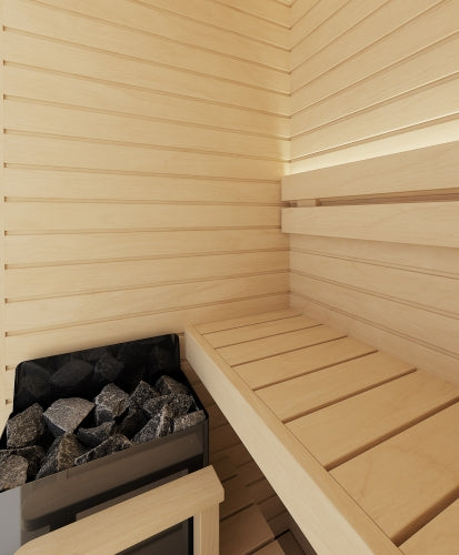 Wooden sauna interior with a bench and a sauna heater.
