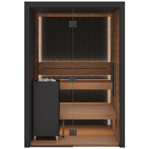 Auroom Vulcana A modern sauna with warm wood shelves, a dark textured back wall, integrated LED lighting, and a sauna heater on the left side, shown against a plain white background.