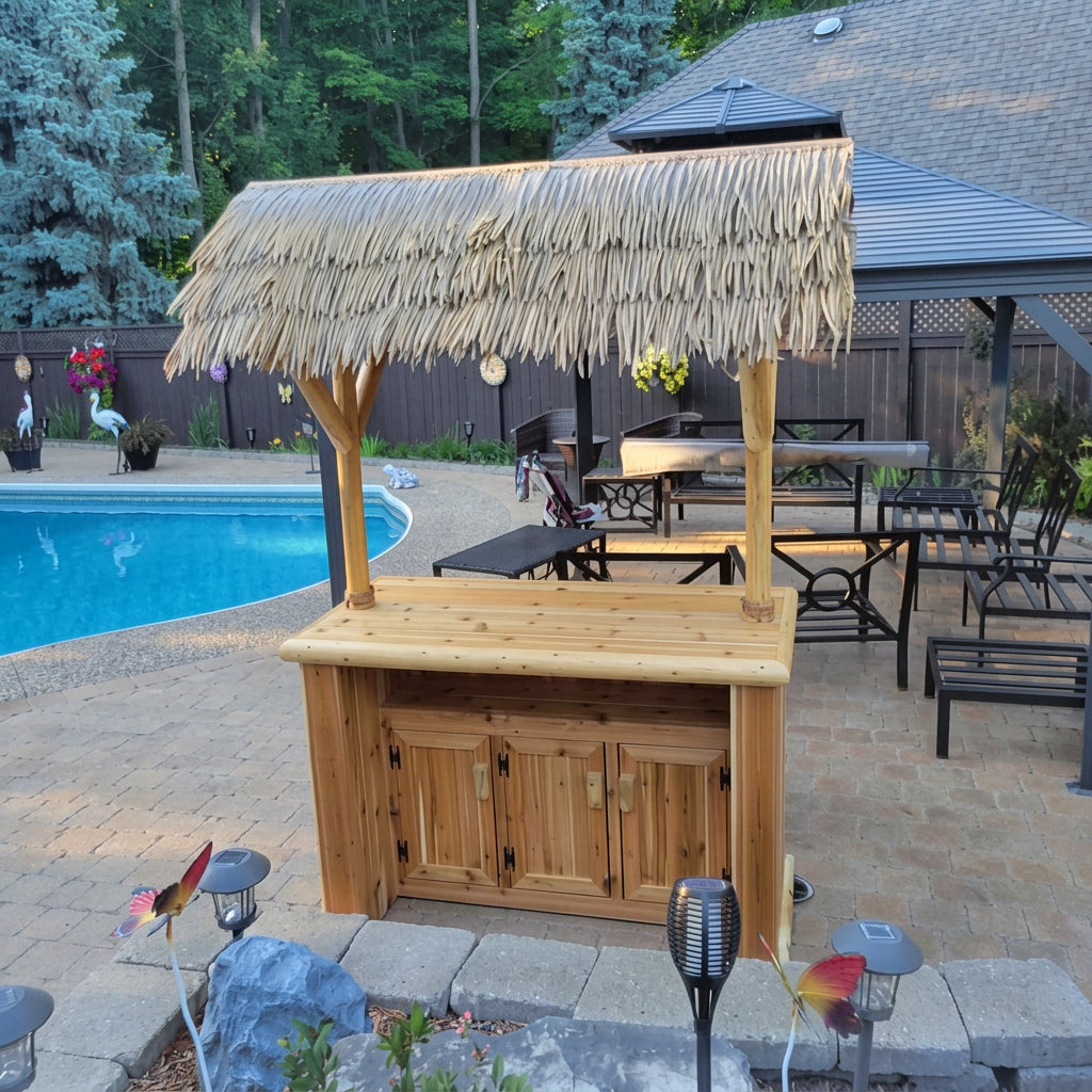 Southern Fantasy tiki bar with thatched roof, rear view near outdoor dining