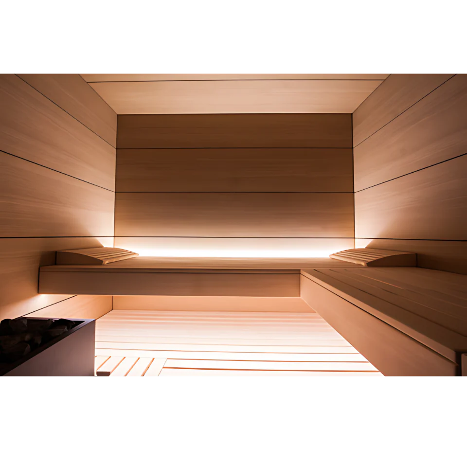 Wooden sauna interior with benches and warm lighting