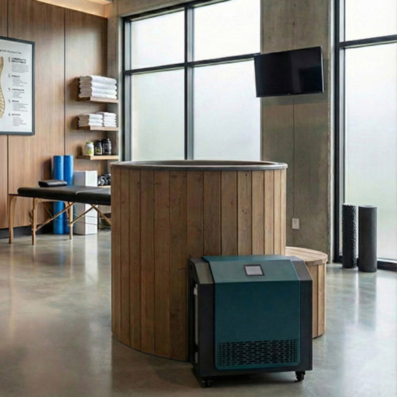 Modern office interior with a wooden barrel hot tub and a chiller