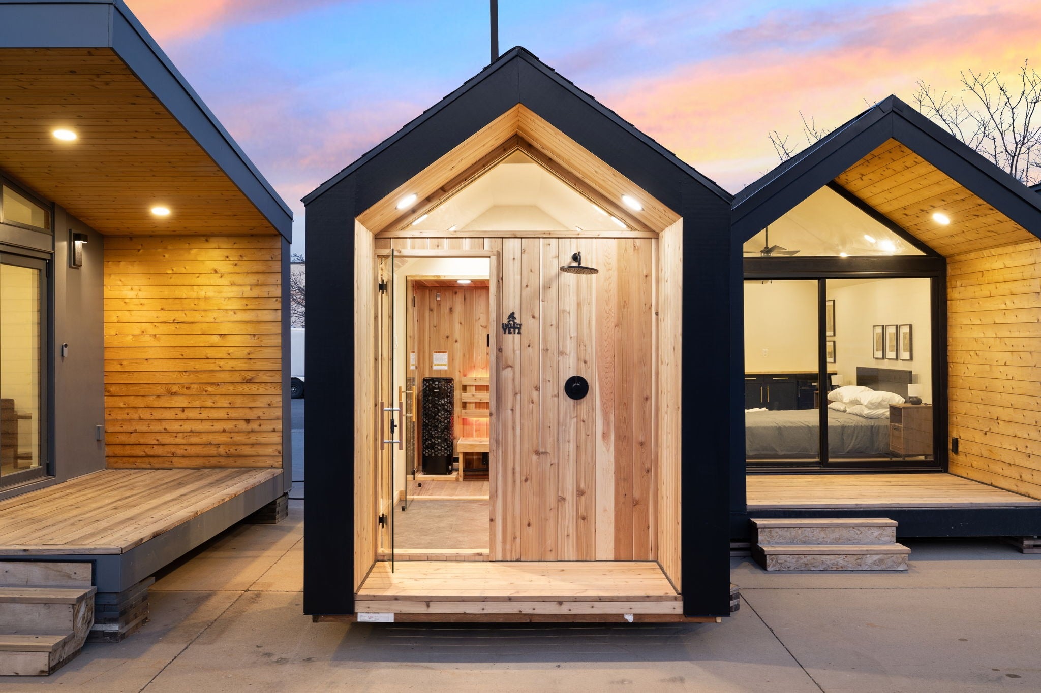 Sweaty Yeti 4-6 Person Outdoor Sauna & Cold Plunge Cabin in a front view.