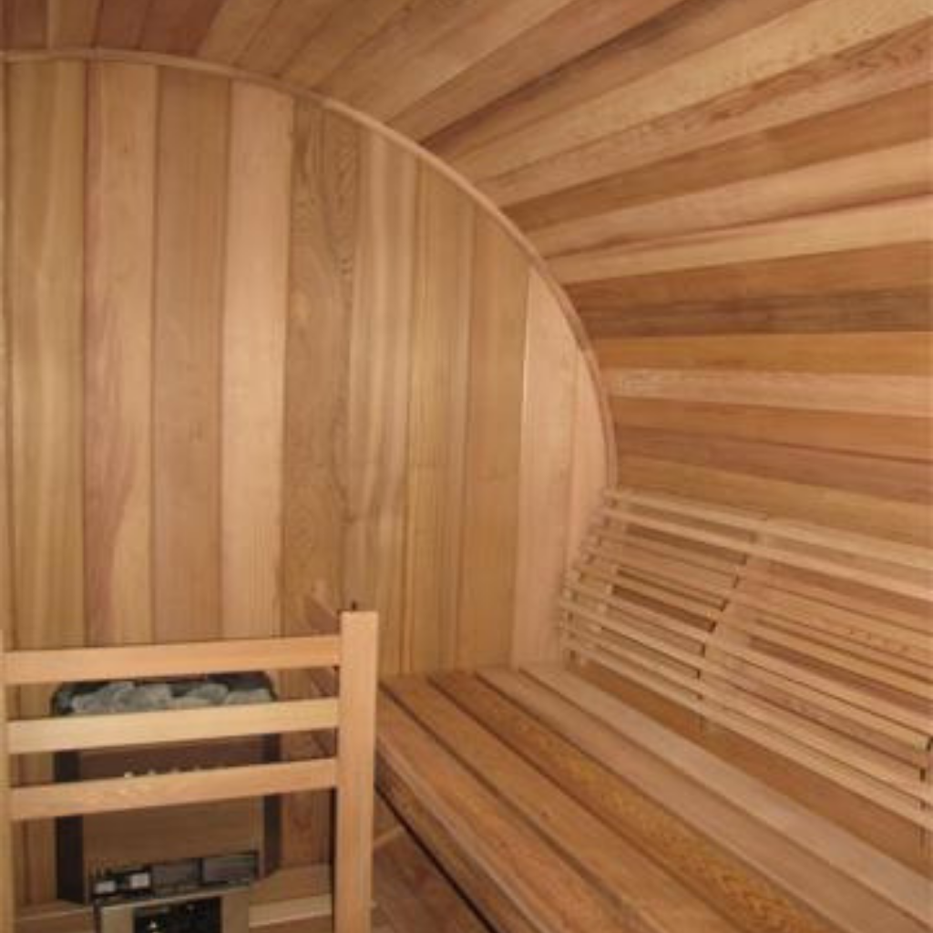 Interior of the BRL6X8 barrel sauna with cedar bench and cedar heater guard