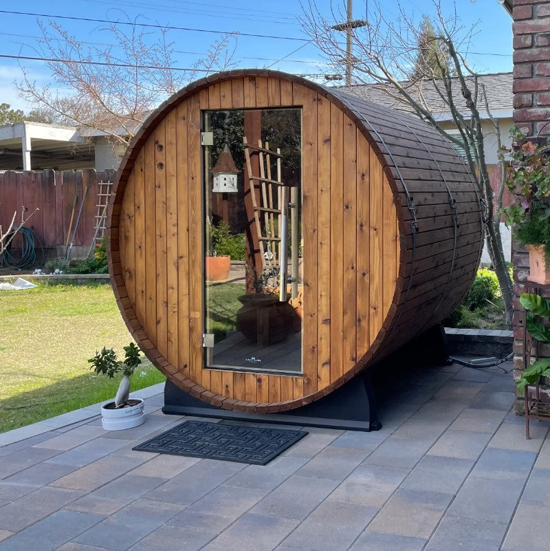 Almost Heaven Pinnacle 4 Person Barrel Sauna in a Backyard