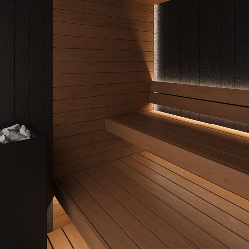 A modern wooden sauna interior with wooden benches, warm ambient lighting along the walls, and a sauna heater with white stones.