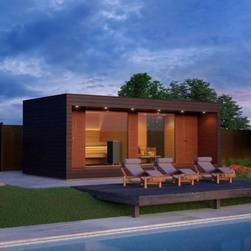 Modern outdoor building with lounge chairs by a pool at dusk