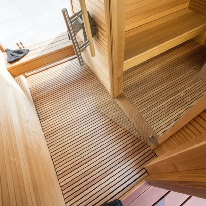 Wooden deck with a step and a broom on a wooden floor