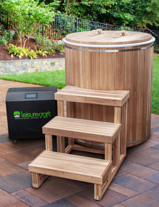 Cold plunge tub with a heater installed in a private backyard wellness space.