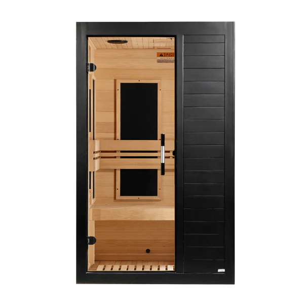 A modern single-door infrared sauna with a black exterior frame and sliding door, featuring light natural wood interior walls, benches, and ceiling panels, shown against a solid white background.