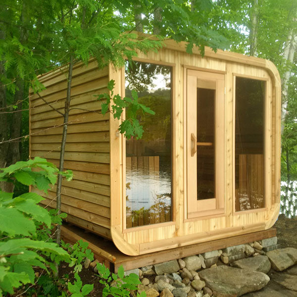 Dundalk Leisure Knotty Cedar Outdoor Luna Sauna slant fron view in lake side