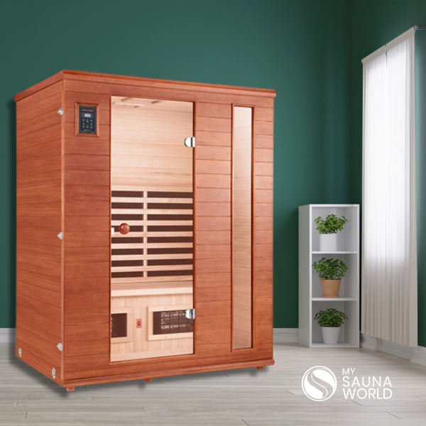 Health Mate Renew  2 Person Infrared Sauna with 3-Green Plants Beside.