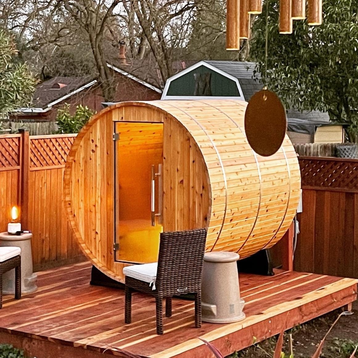 Almost Heaven Pinnacle 4 Person Barrel Sauna in a Backyard Platform