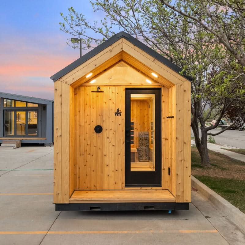 Sweaty Yeti 4-6 Person Outdoor Sauna & Cold Plunge Cabin in clear front view.